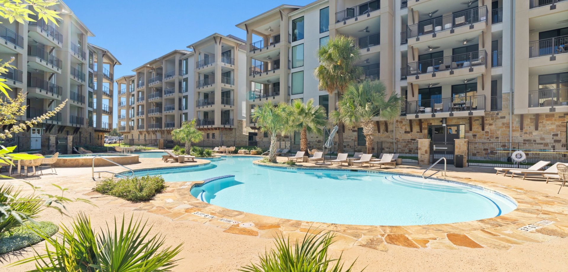 Pool and Exterior shot of Signature Condos at Horseshoe Bay Resort